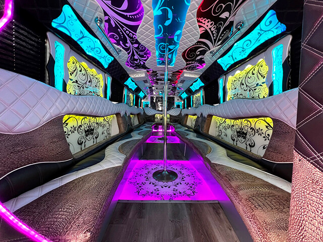 party bus service with dance poles and leather seating