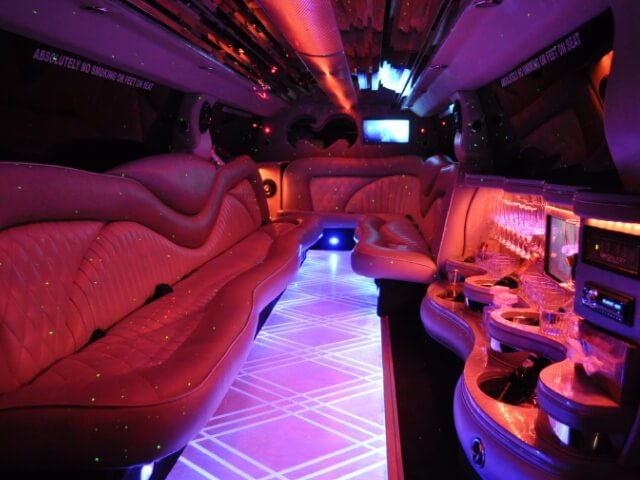 Luxury limousine with wet bar and colorful LED lights