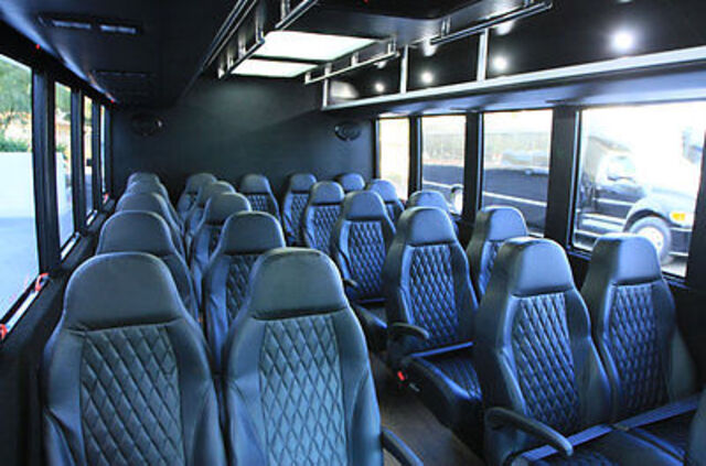 mini bus rental in the Chicago area with PA system and reclining seats