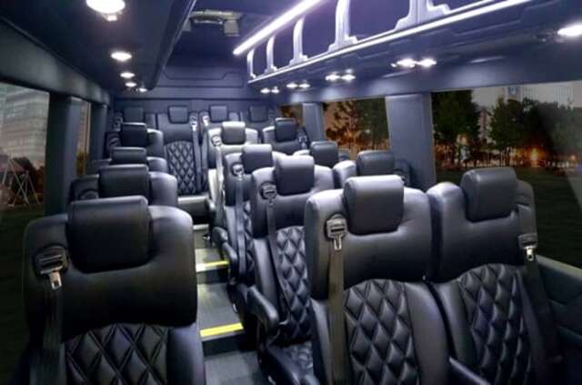 Chicago bus rental with reclining seats and overhead storage